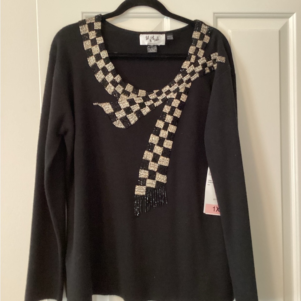 Talk of the Walk Black V-Neck Sweater with Silver and black accents to